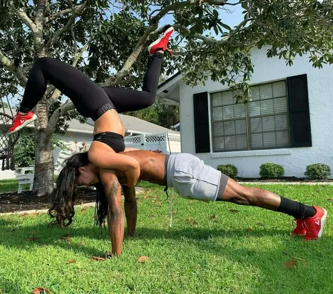 Photo shared by DJ Townsel on April 25, 2020 tagging @aloyoga, @vivobarefoot, @langleav, @veda_yoga108, and @couplegoals. Image may contain: one or more people, shoes, dog, child, grass and outdoor