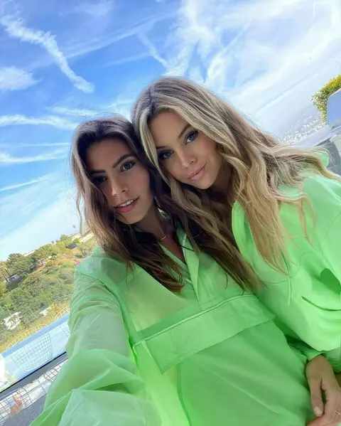 Photo shared by Bree Lynn Kleintop on May 07, 2020 tagging @aloyoga, and @mackenziealtig. Image may contain: 2 people, people standing, sky, cloud and outdoor