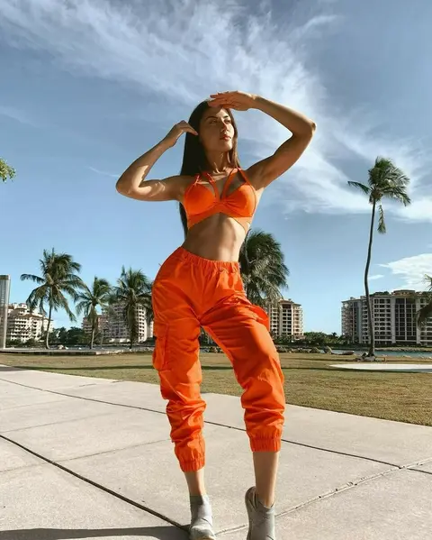 image by georginamazzeo containing Orange, Muscle, Photography, Trousers, Sportswear