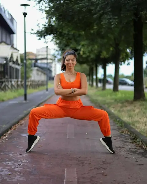 image by martina__rando containing Orange, Red, Physical fitness, Sitting, Kung fu