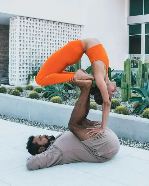 image by acrowithjon containing Physical fitness, Yoga, Leg, Orange, Stretching