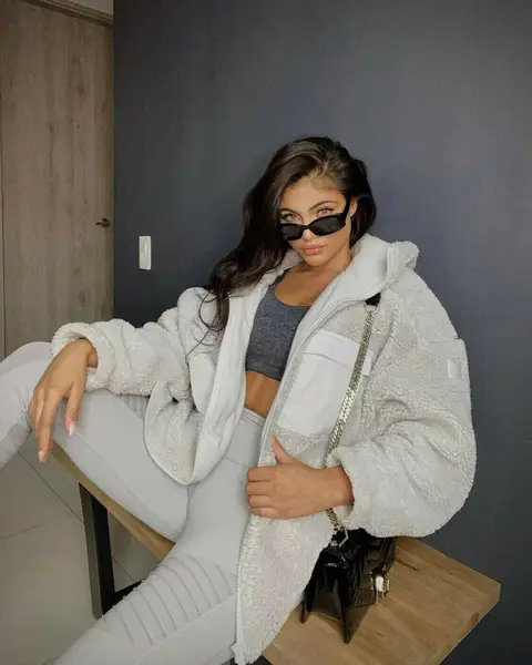 image by saraorrego containing White, Eyewear, Shoulder, Sitting, Outerwear