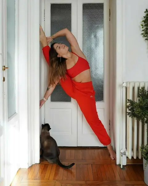 image by martina_sergi containing Red, Leg, Long hair, Thigh, Stretching