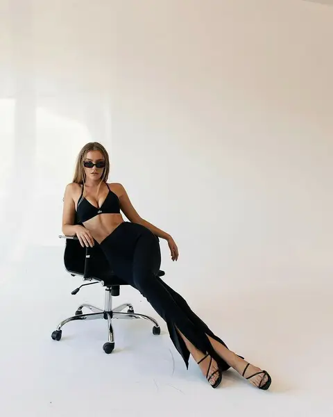 image by georgiagibbs_ containing woman, chair, black, sit, office chair