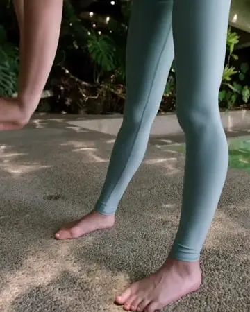 video by aloyoga containing Joint, Leg, White, Green, People in nature
