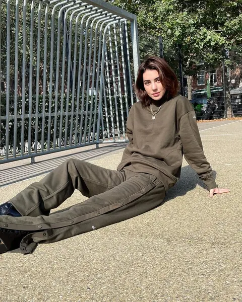 image by adelaidekane containing Leg, Grass, Street fashion, People in nature, Leisure
