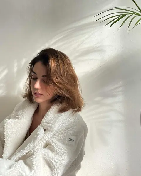 image by adelaidekane containing Skin, Lip, Outerwear, Neck, Comfort