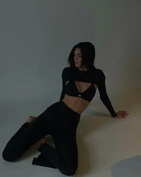 image by kendalljenner containing woman, black, floor, pose, dress