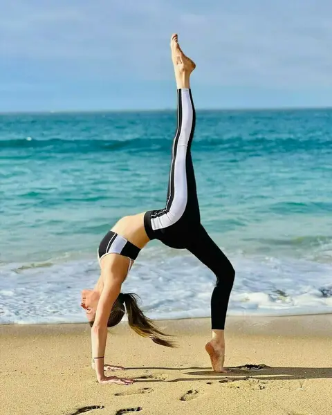 image by yoga_ky containing Water, Sky, Leg, yoga pant, People in nature