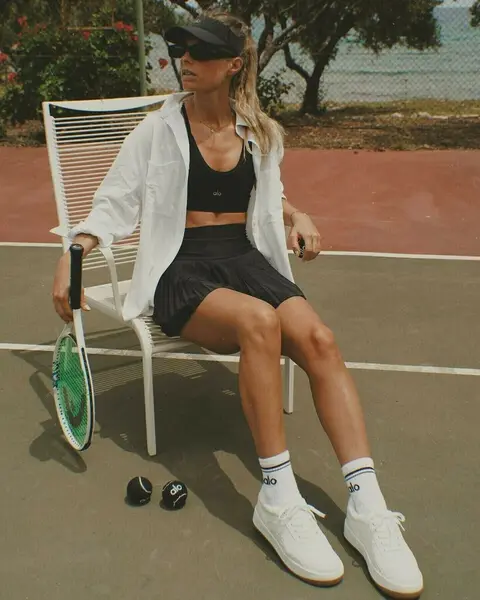 image%20by%20debiflue%20containing%20Shoe%2C%20Sports%20equipment%2C%20Tennis%20racket%2C%20Tennis%20player%2C%20Sunglasses