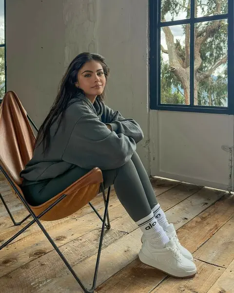 image by saraorrego containing sit, woman, chair, shoe, white