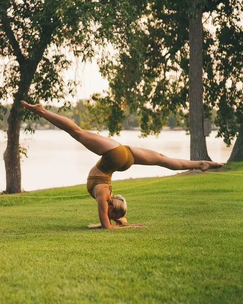image by neyu_ma containing woman, yoga, grass, practice, park