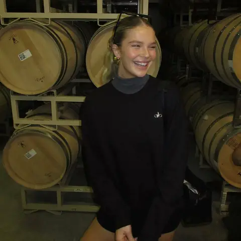 image by elliethumann containing woman, stand, barrel, winery, wine