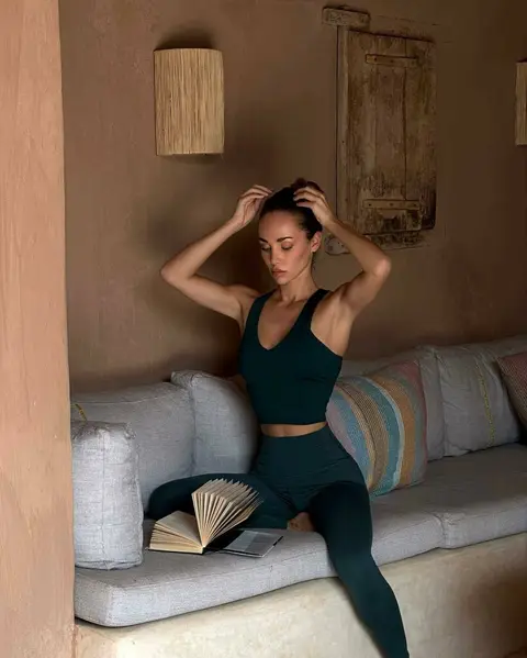 image by abrilraluy containing woman, couch, book, sit, pose