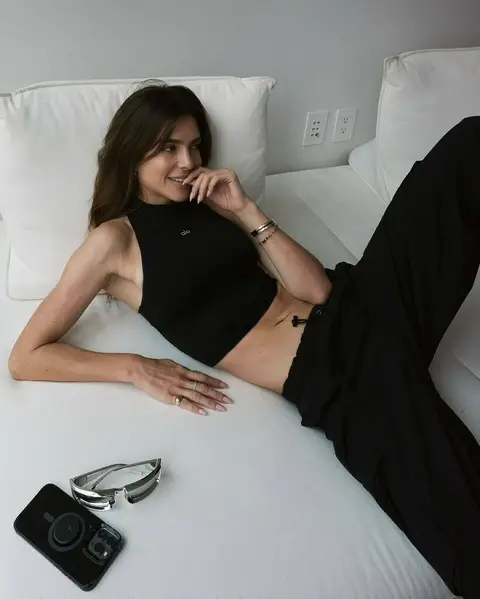 image by valentinaferrer containing woman, bed, lay, black, dress