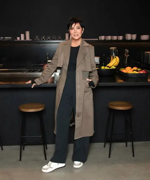 image by krisjenner containing woman, stand, stool, coat, trench coat