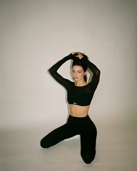 image by kendalljenner containing woman, black, pose, floor, wear