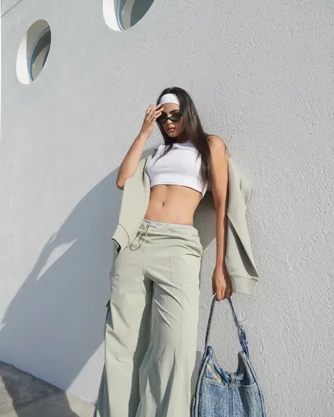 image by saraorrego containing woman, white, crop top, wear, pant
