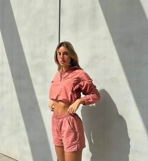 image by shir.levyy containing woman, pink, short, stand, wear
