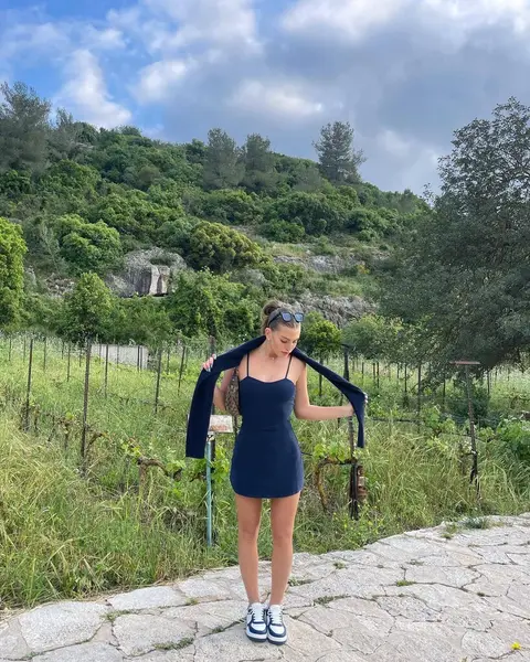 image by malkovtaylor containing woman, stand, dress, path, catch