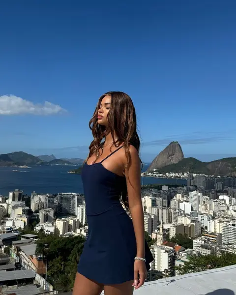 image by juliananalu containing woman, dress, city, stand, blue