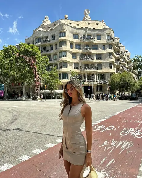 image by shir.levyy containing woman, stand, building, dress, road