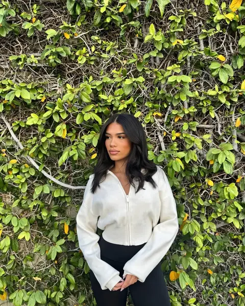 image by aishamian containing woman, stand, white, black, sweater
