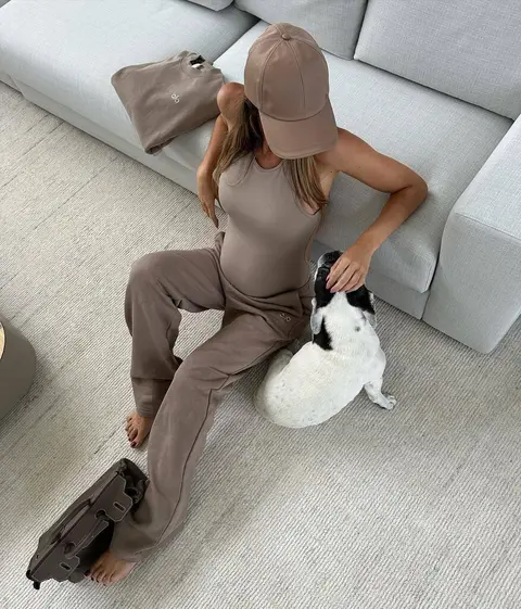 image by elenagalera containing woman, couch, dog, sit, cat