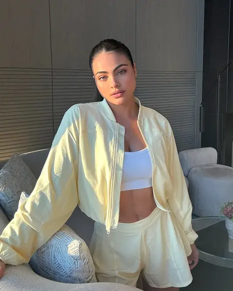 image by saraorrego containing woman, sit, white, couch, jacket
