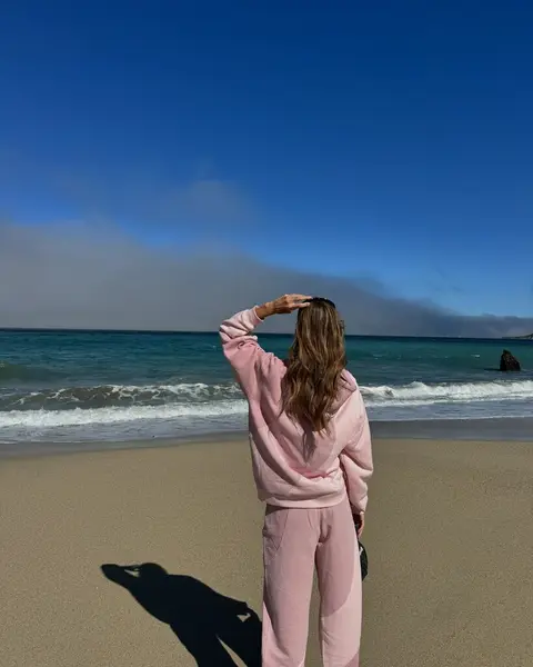 image by mariannefonseca containing beach, woman, stand, pink, sea