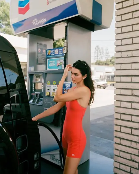 image by kendalljenner containing woman, gas station, red, car, dress