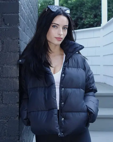 image by reneemurden containing woman, stand, jacket, wall, wear
