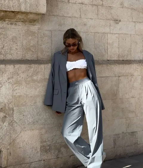 image by shir.levyy containing woman, wall, pant, suit, white