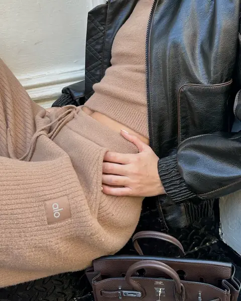 image by cindymello containing woman, handbag, sit, leather jacket, bag