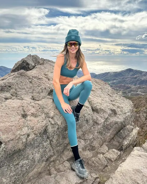 image by ludidelfino containing woman, stone, sit, mountain, blue