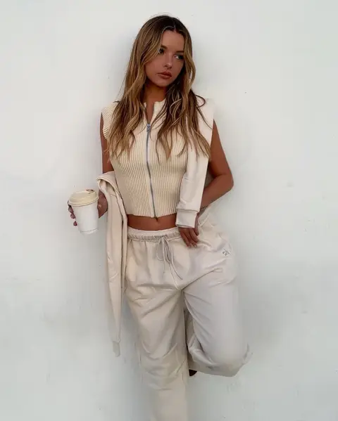 image by madtev containing woman, white, wall, pant, coffee