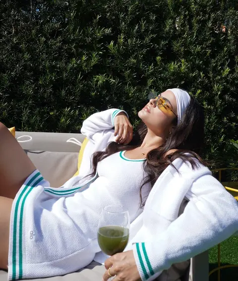 image by saraorrego containing woman, drink, lay, cup, green
