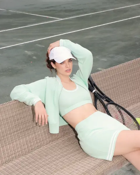 image by nadiaferreira containing woman, tennis racket, sit, tennis court, lay