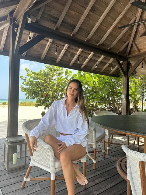 image by elenagalera containing woman, sit, chair, white, beach
