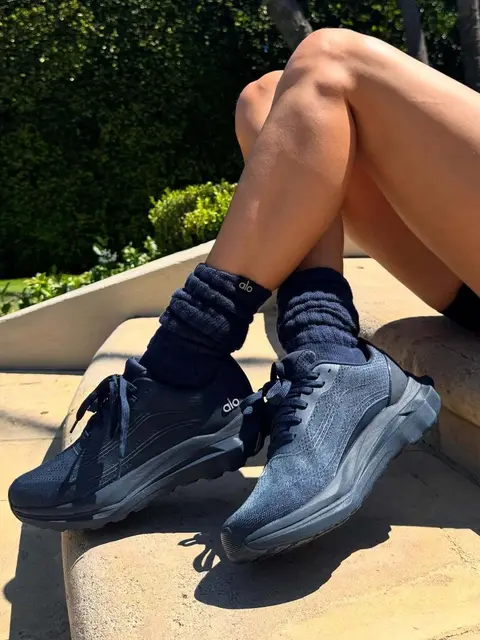 image by joycorrigan containing shoe, sit, sock, woman, person