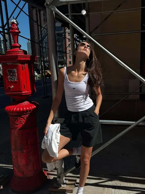 image by blancapadilla containing woman, hydrant, red, white, stand
