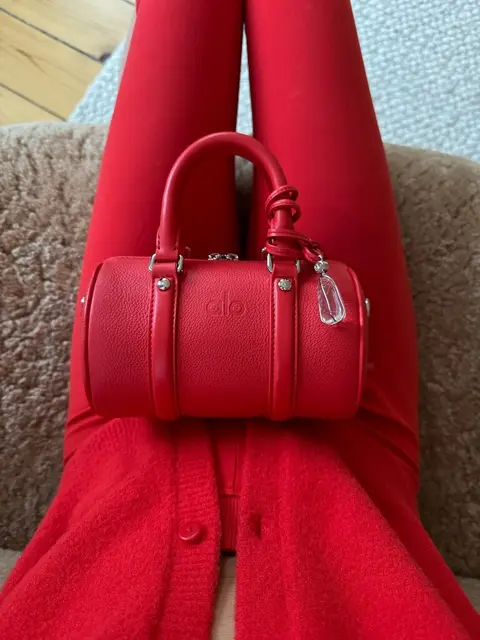 image by annawinck containing red, handbag, woman, leg, bag