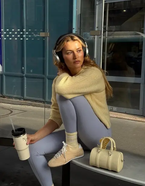 image by alo containing sit, woman, earphone, bench, coffee