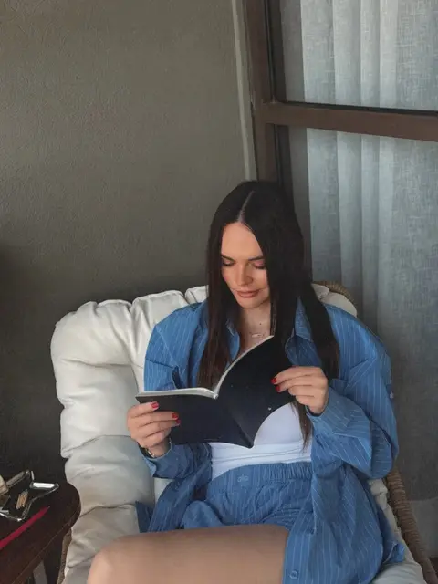 image by fabiolagdo containing woman, book, bed, read, sit