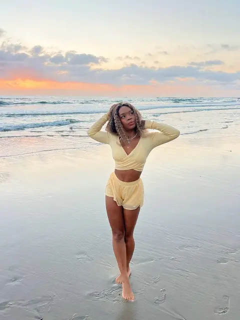 image by phyllicia.victoria containing woman, beach, stand, yellow, pose